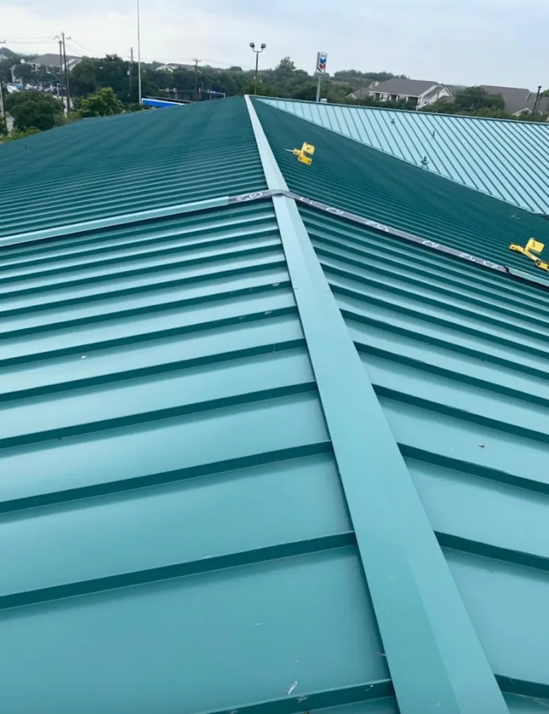 Green commercial metal roof ridge and valley for Metal Roof Repair in Benson
